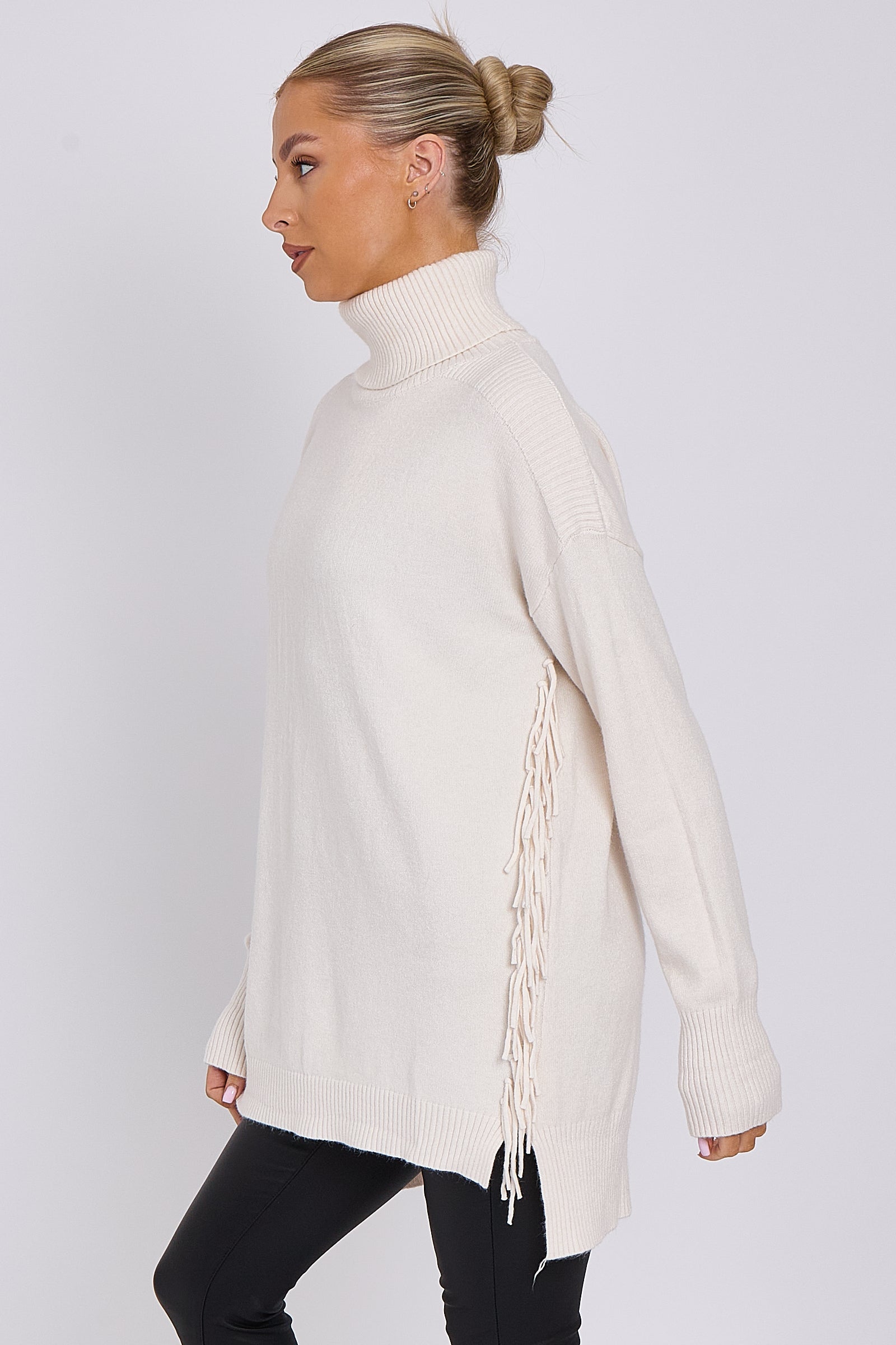 Cream Roll Neck Jumper with Tassels Aftershock London