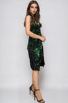 Mini-robe portefeuille verte en velours à sequins